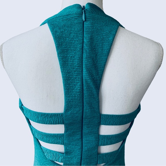 OFF  BEBE TEAL BODYCON RIBBED CUTOUT MINI DRESS - Picture 9 of 15